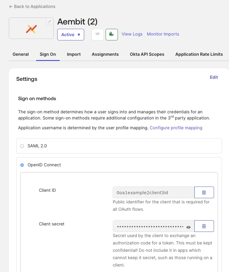 Okta Sign On tab showing the Client ID and the masked Client secret